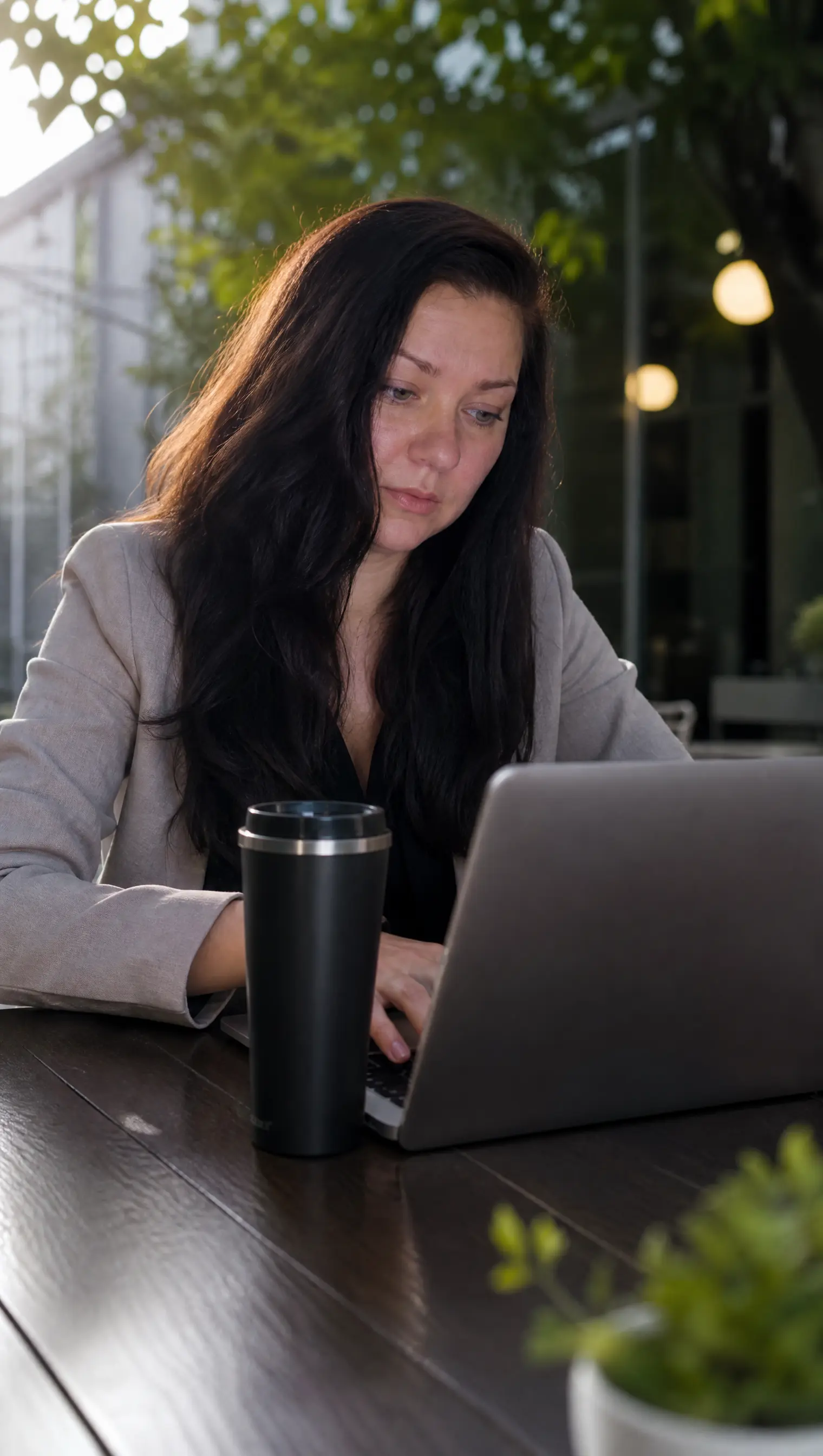 Working on a laptop outdoors